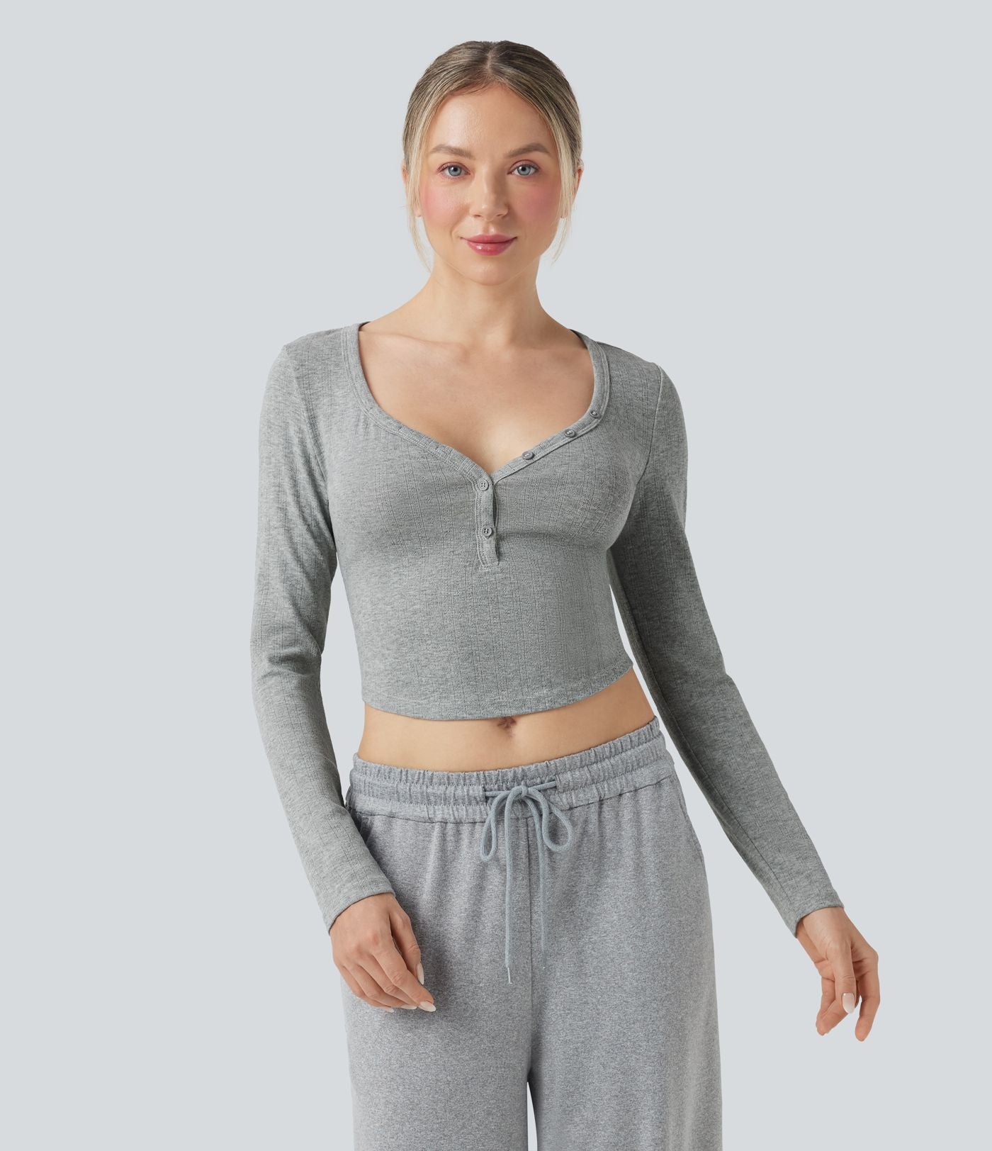 Haut détente cropped maille côtelée col henley manches longues