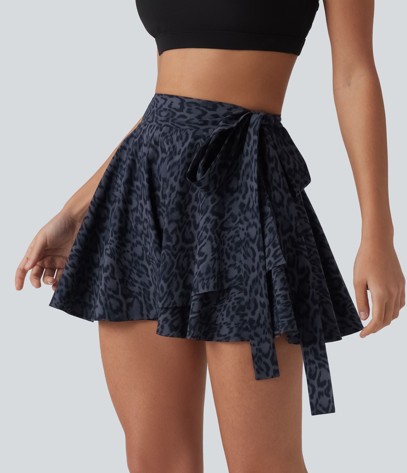 Jupe tennis mini fluide 2-en-1 taille haute imprimé léopard avec liens latéraux et poche