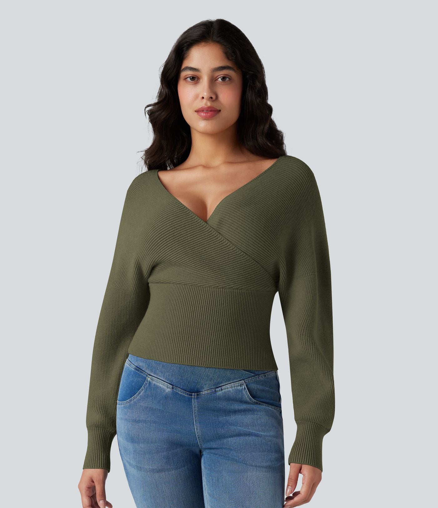 Pull col V manches chauve-souris longues à découpes