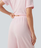 Combinaison-chemise accès facile Easy Peasy en coton froissé rayé à manches courtes, cache-cœur, lien au dos et poches