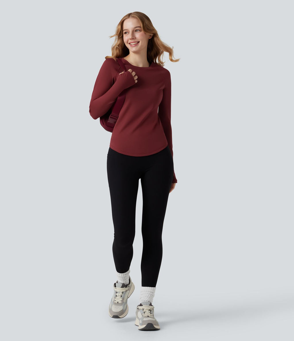 Top de sport col rond ourlet arrondi manches longues avec trous pouces et poche