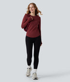 Top de sport col rond ourlet arrondi manches longues avec trous pouces et poche