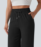 Pantalon casual 7/8 taille haute aspect lin à cordon de serrage et ourlet arrondi avec poches