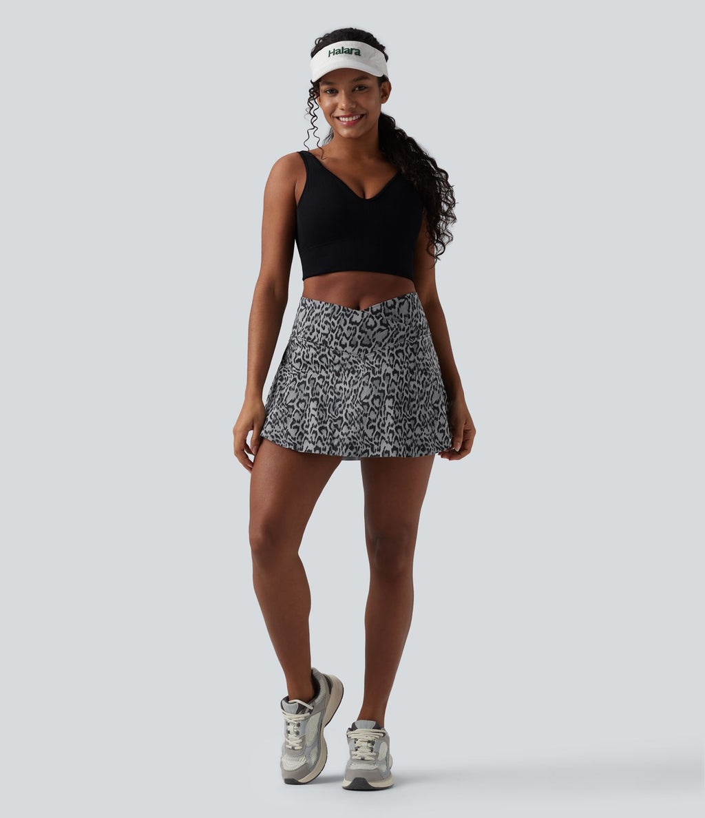 Jupe-short de tennis mini taille haute croisée imprimé léopard avec poches