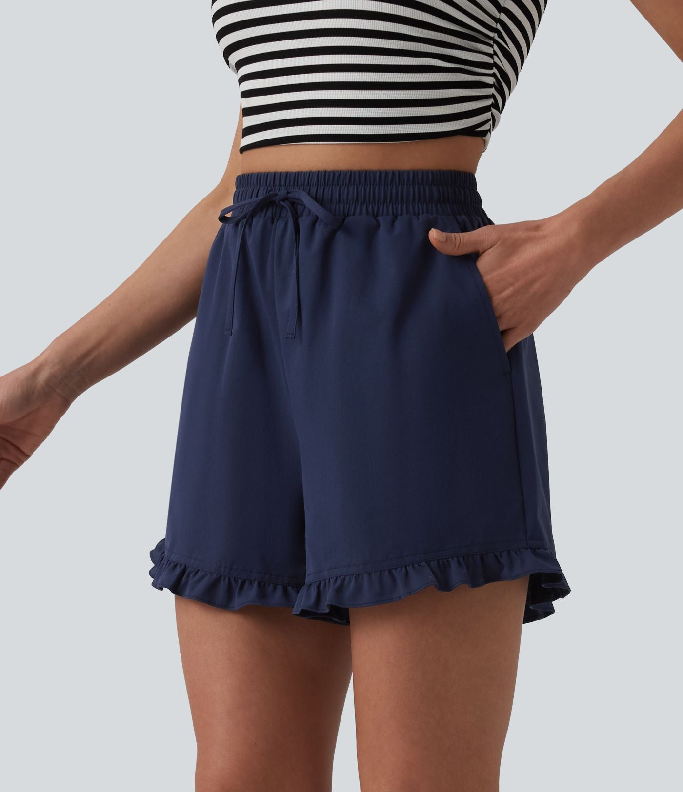 Short casual ample taille haute en popeline extensible à cordon de serrage et ourlet volants avec poches