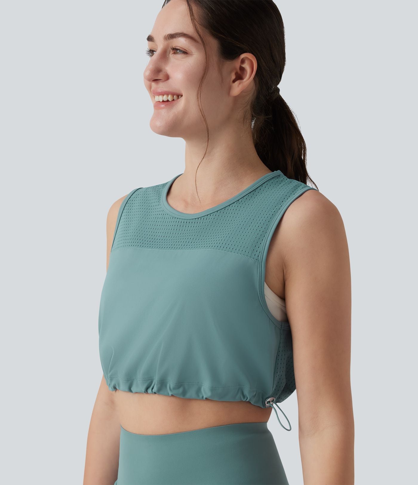 Débardeur yoga court col rond mesh respirant avec ourlet à cordon de serrage