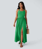 Robe longue fluide fendue avec poches latérales, dos nu et effet torsadé