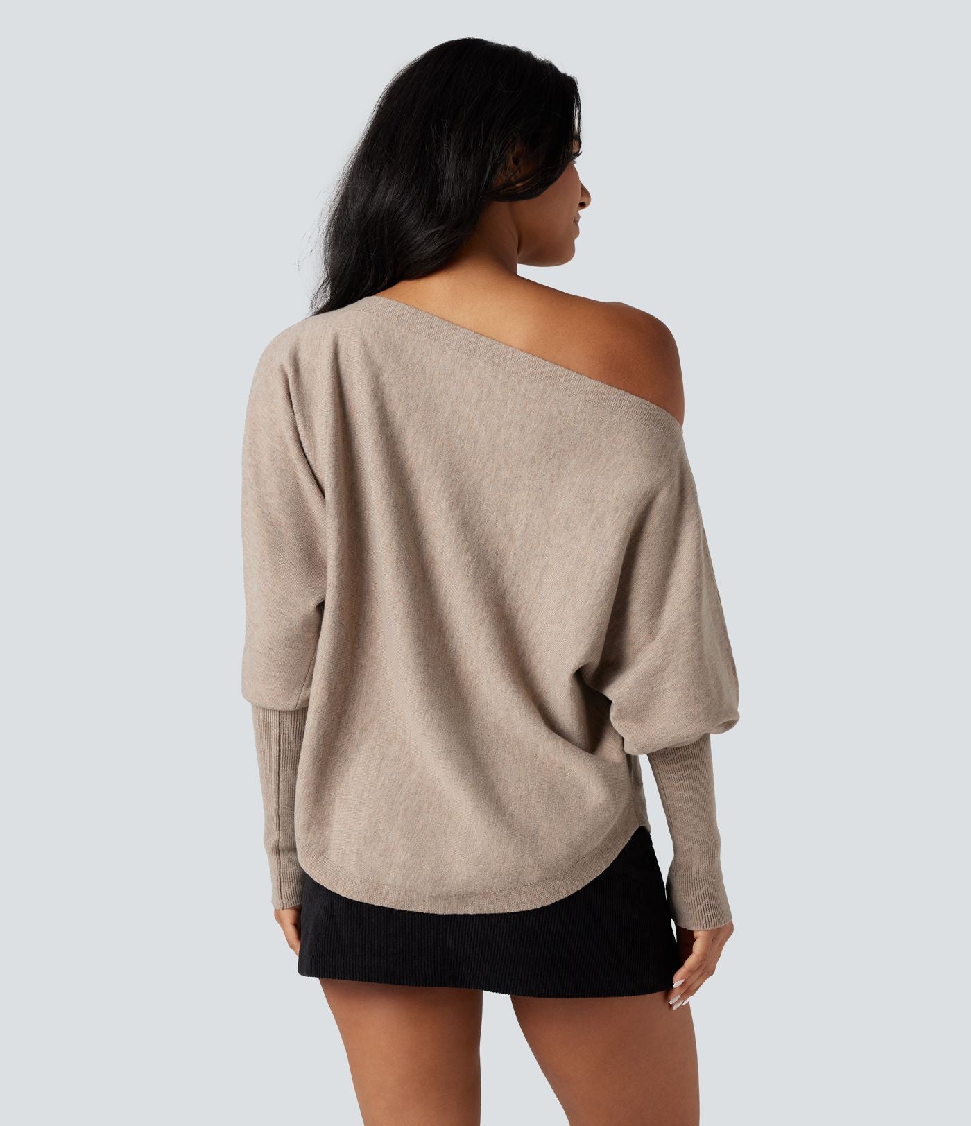 Pull une épaule manches chauve-souris ourlet arrondi