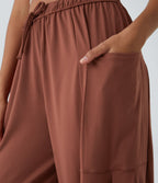 Pantalon Large Fluide Taille Mi-Haute Taille Élastique Cordon Poches Latérales Ourlet Flottant