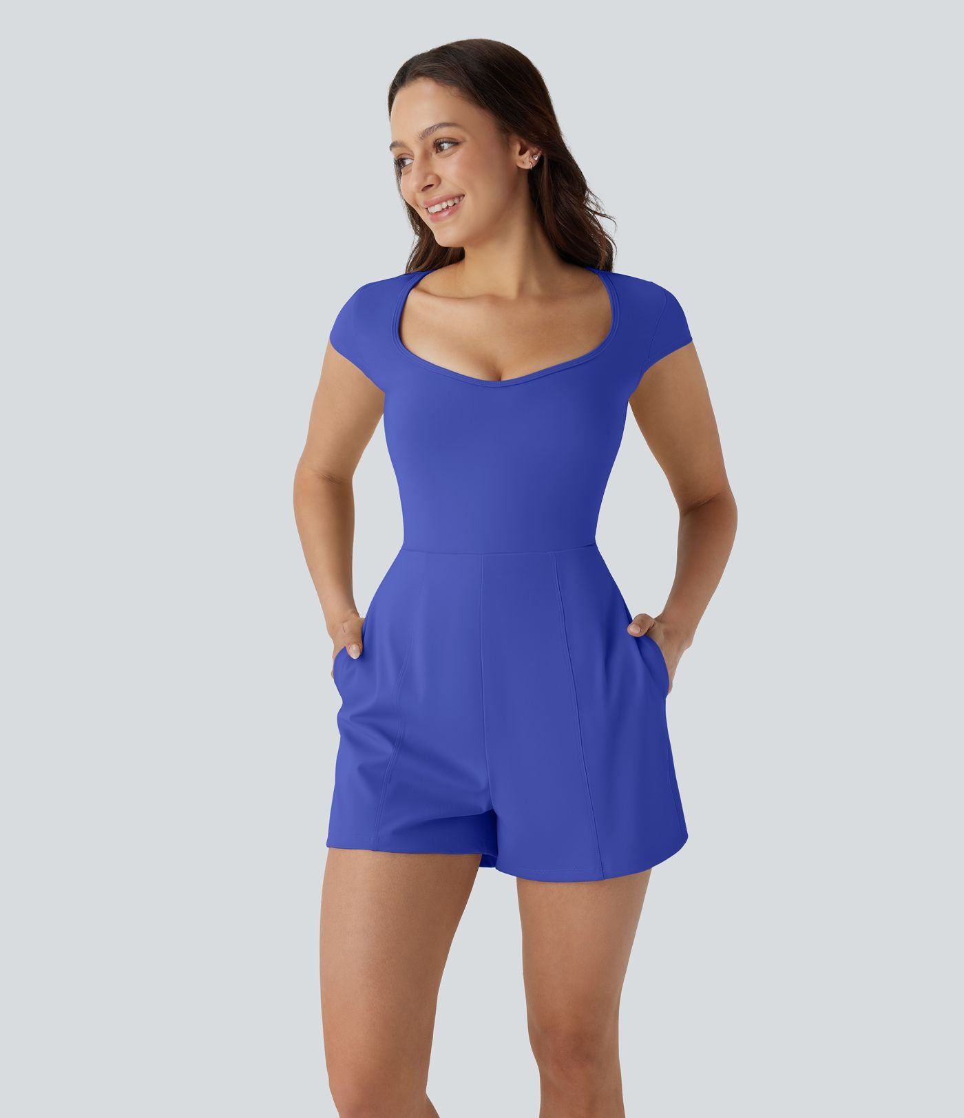 Combinaison de yoga Softlyzero™ Airy avec col U, manches courtes et poches latérales - Édition Easy Peasy