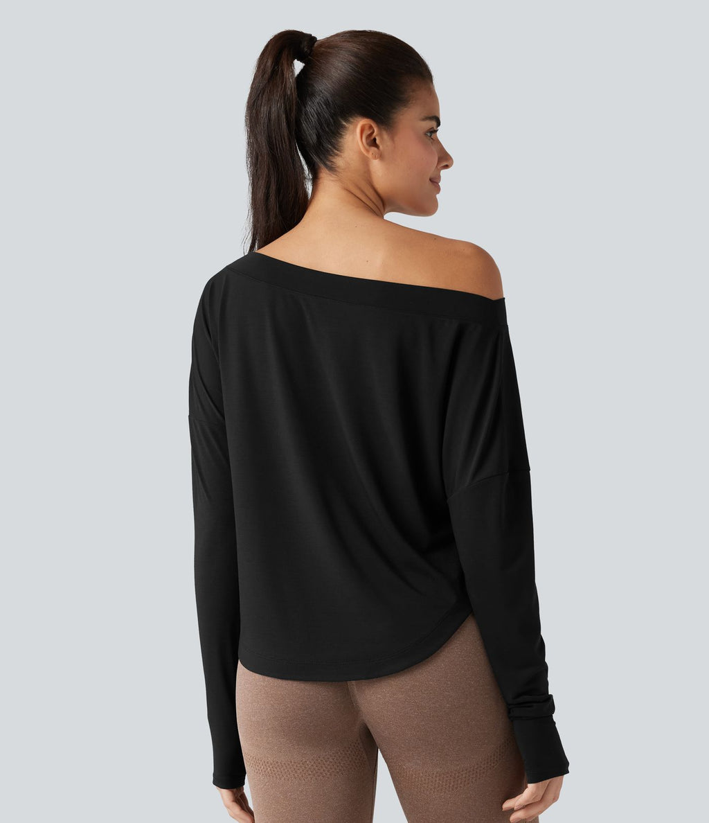 Top de sport yoga asymétrique une épaule manches longues avec trou pour le pouce, ourlet arrondi asymétrique et séchage rapide