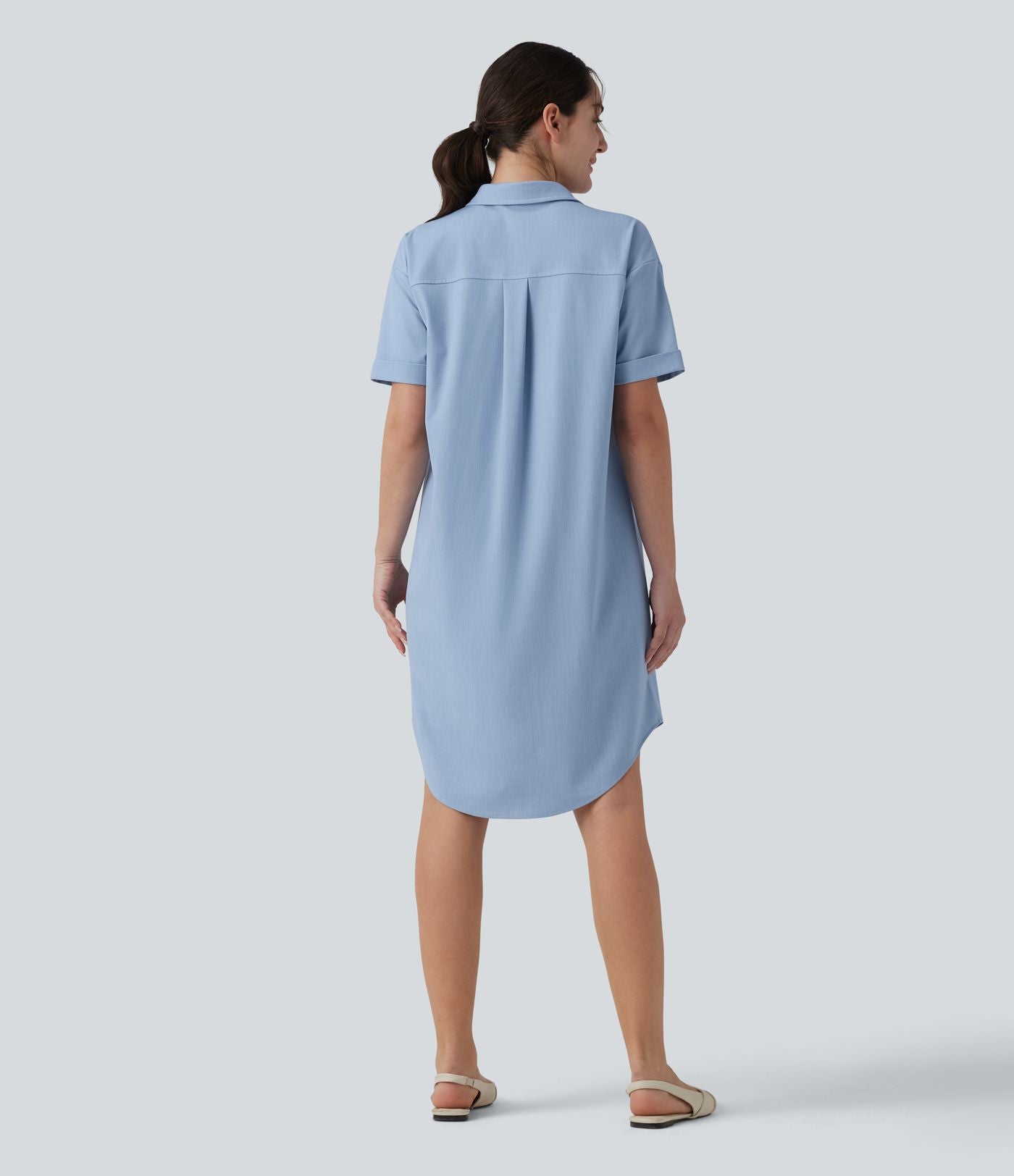 Robe casual mi-longue col manches courtes ourlet courbe avec poches