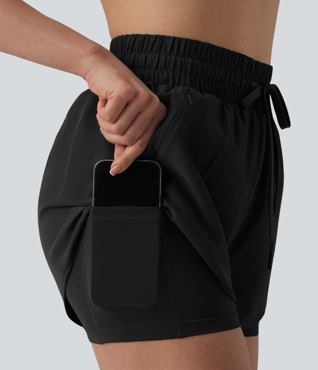 Short running 2-en-1 taille haute avec cordon de serrage et poches