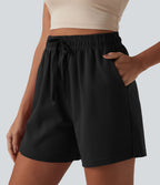 Short casual ample coton séchage rapide taille haute à cordon de serrage et ourlet fendu avec poches