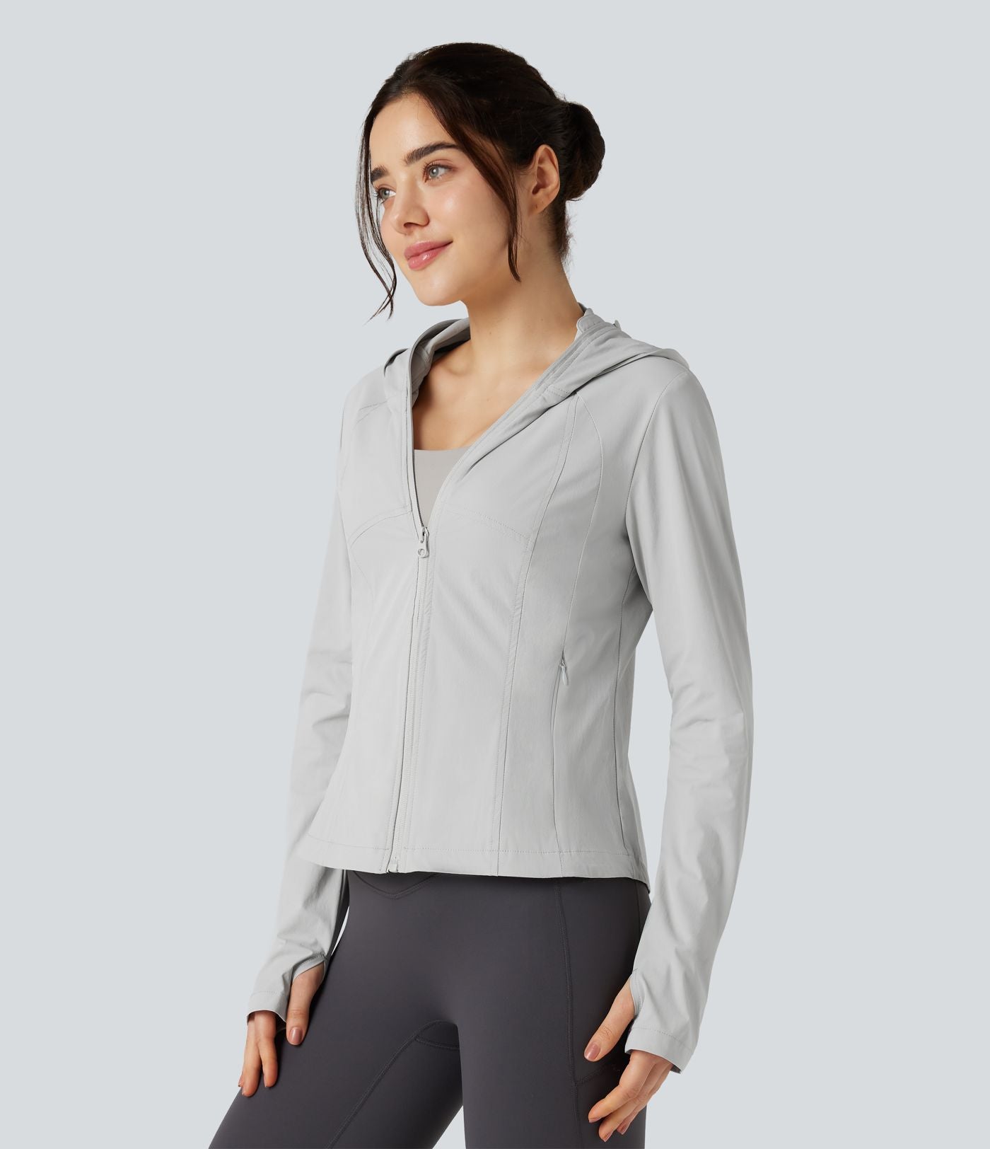 Veste de randonnée à capuche, manches longues, passants pouces et zip avec poches - UPF40+