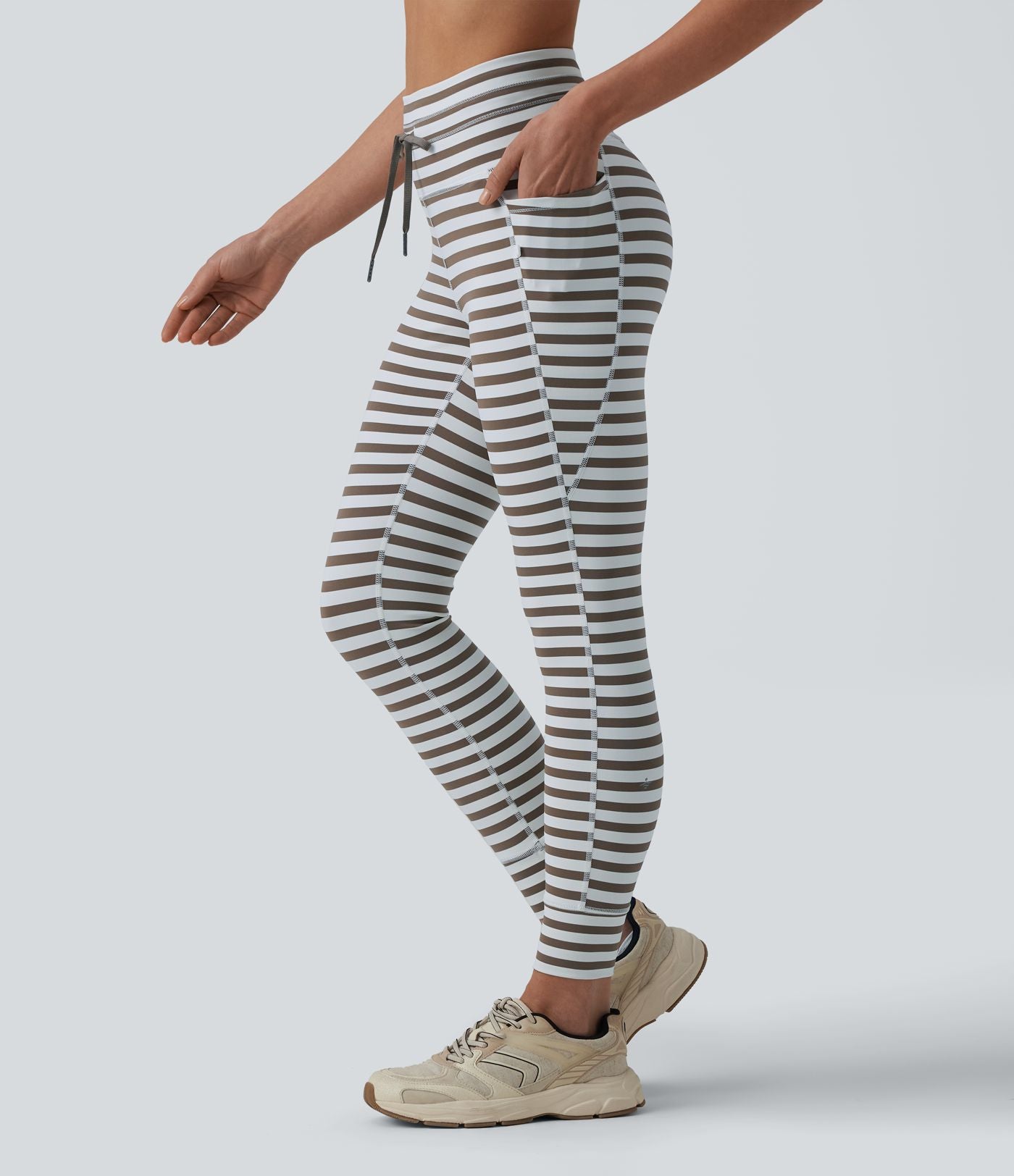 Legging yoga 7/8 taille haute à rayures et cordon de serrage avec poches