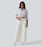 Chemise casual col manches retroussées torsadée asymétrique à rayures