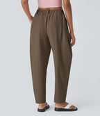 Pantalon tailleur ample, taille moyenne, coupe barrel, à poches