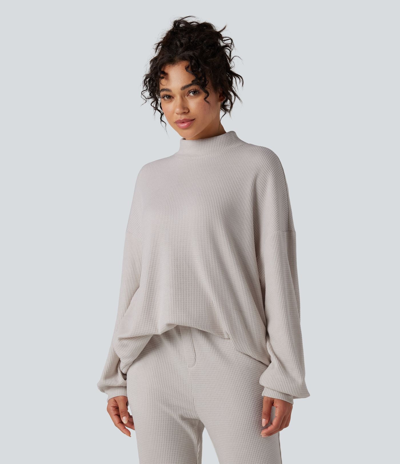 Sweat-shirt gaufré col montant manches longues coupe décontractée avec poches