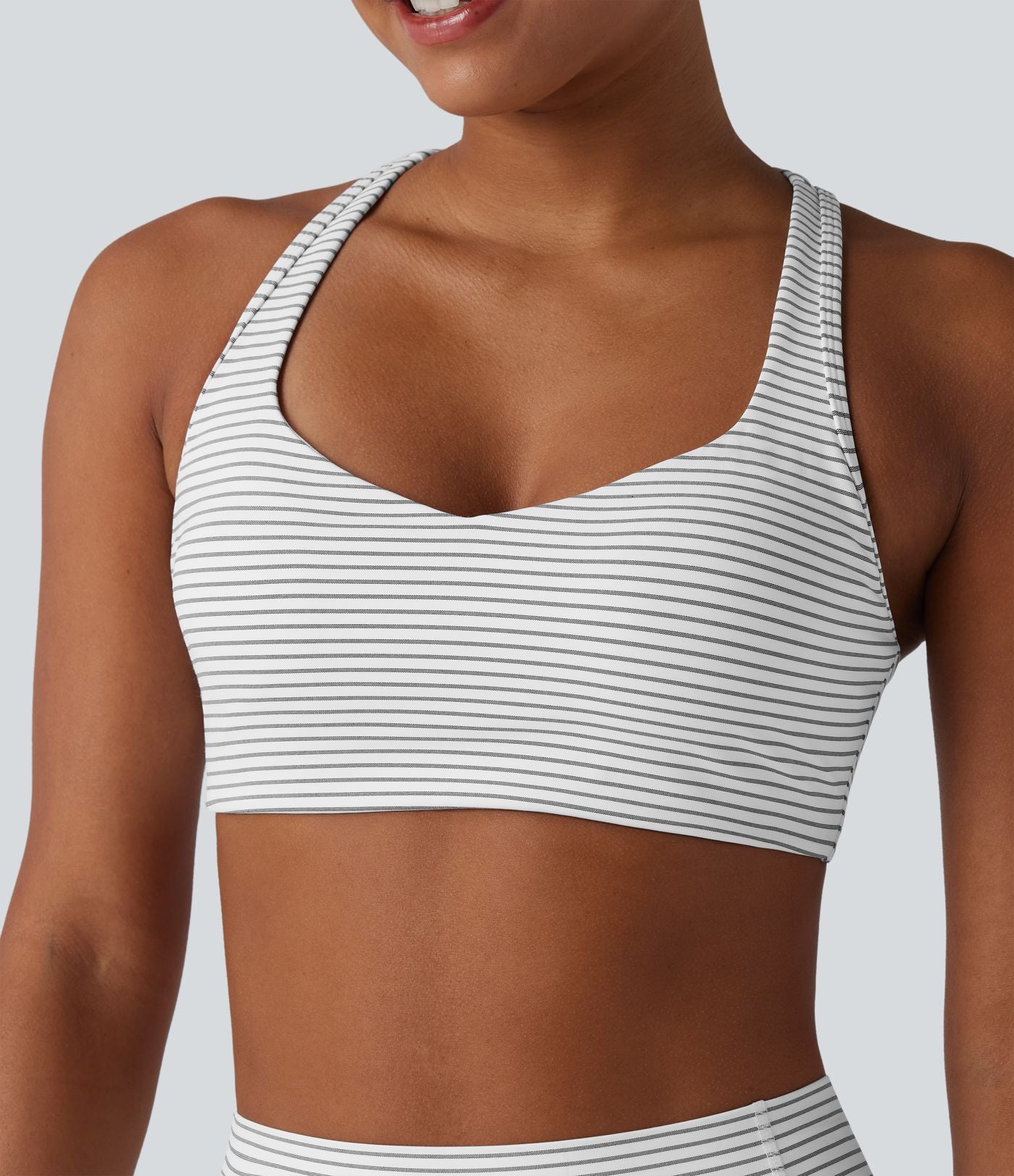 Brassière de sport d'entraînement soutien moyen dos nageur à rayures