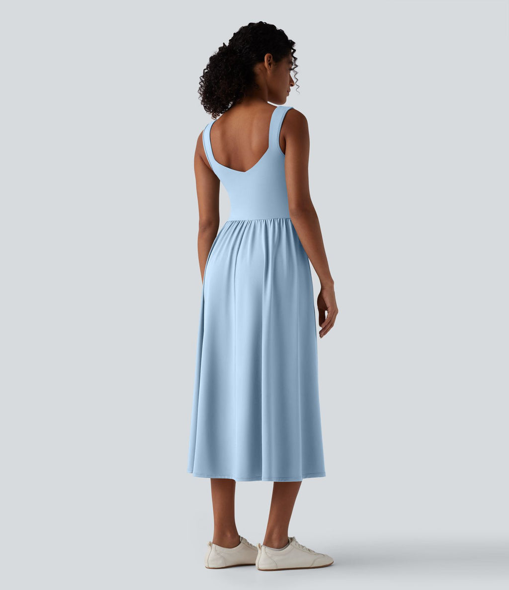 Robe midi fluide sans manches dos croisé ouvert avec poches