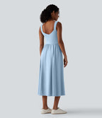 Robe midi fluide sans manches dos croisé ouvert avec poches