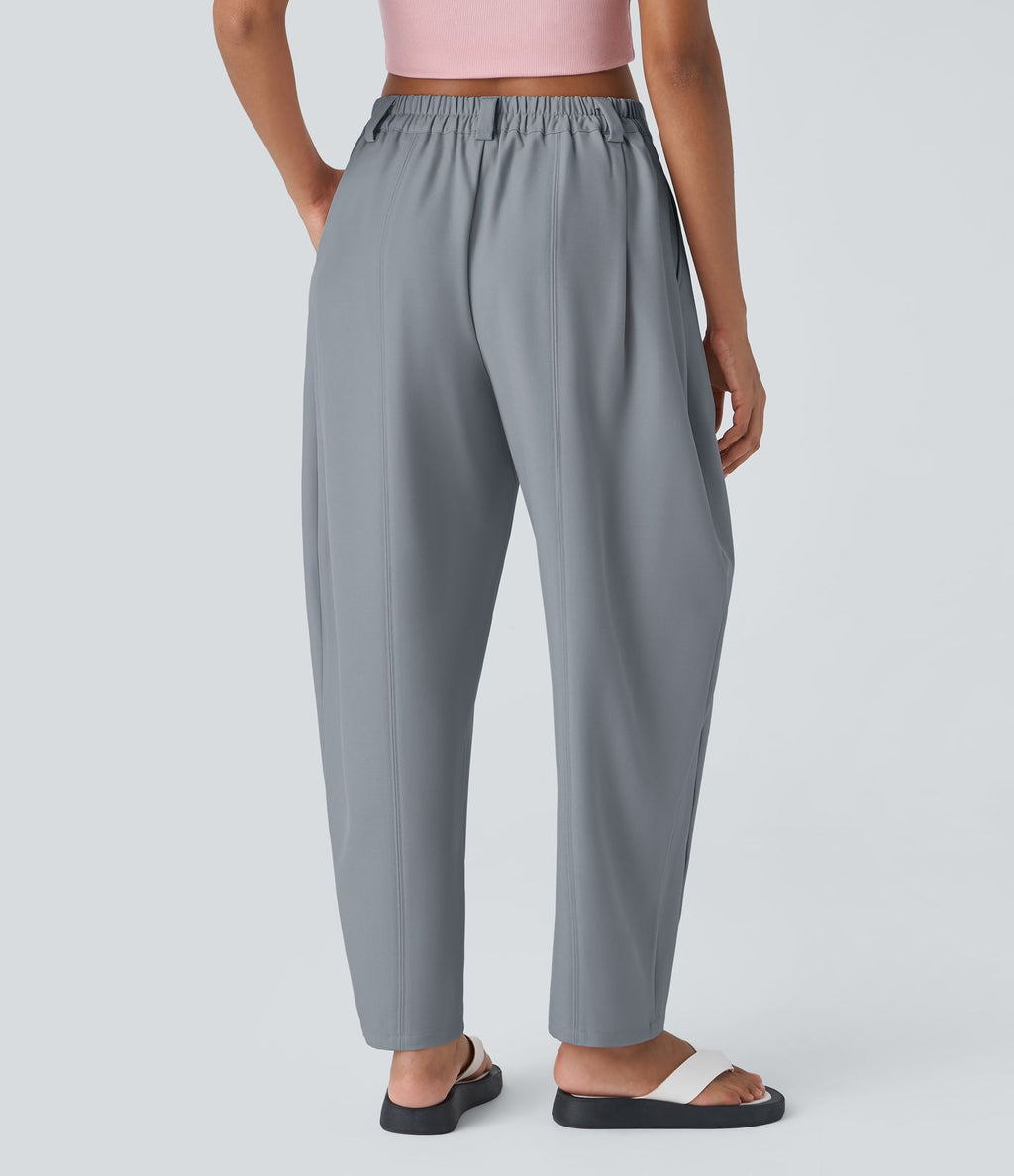 Pantalon tailleur ample, taille moyenne, coupe barrel, à poches