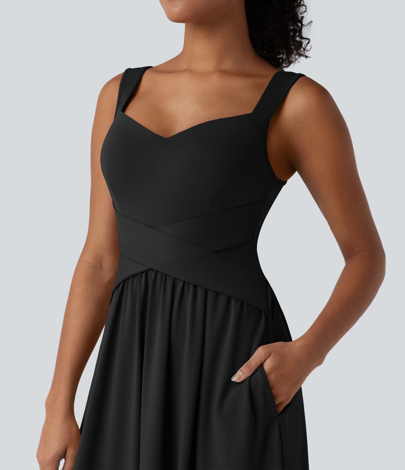 Robe midi fluide sans manches dos croisé ouvert avec poches