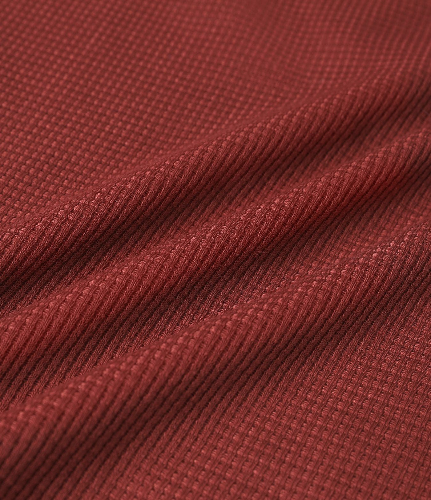 Top gaufré à capuche col Henley manches longues