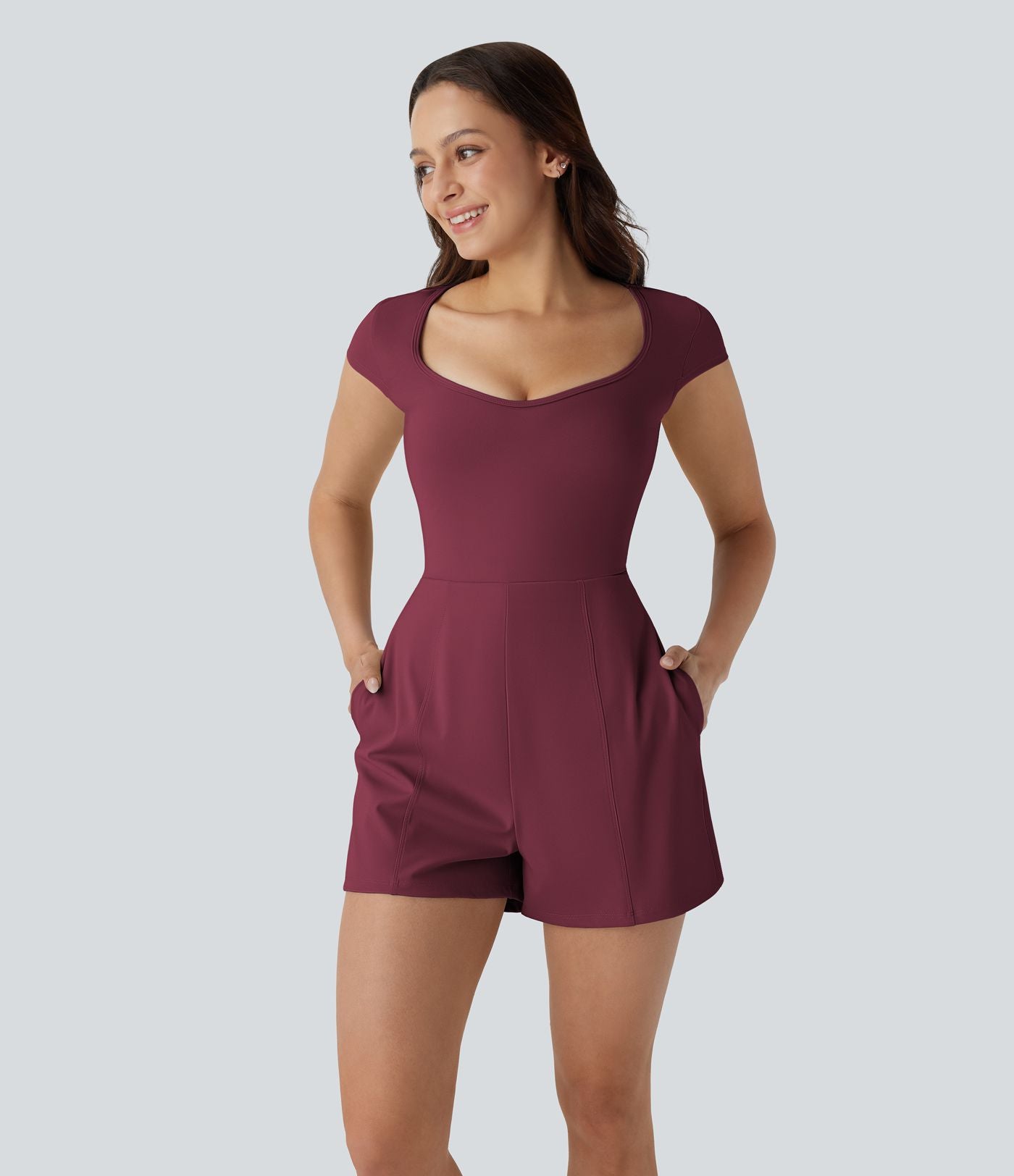 Combinaison de yoga Softlyzero™ Airy avec col U, manches courtes et poches latérales - Édition Easy Peasy