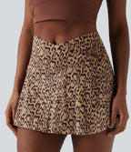 Jupe-short de tennis mini taille haute croisée imprimé léopard avec poches