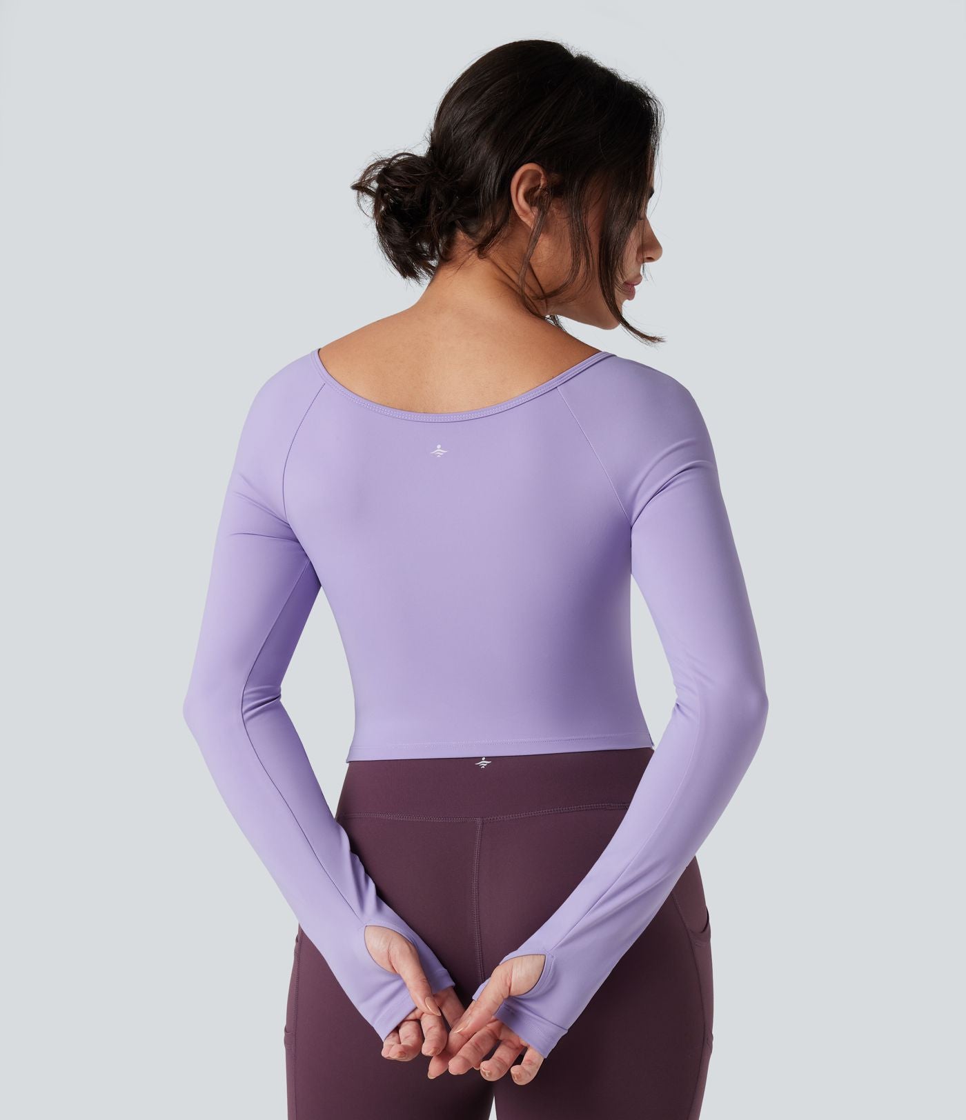 Top de sport yoga SoftlyZero™ Plush col rond ourlet croisé manches longues avec trous pouces