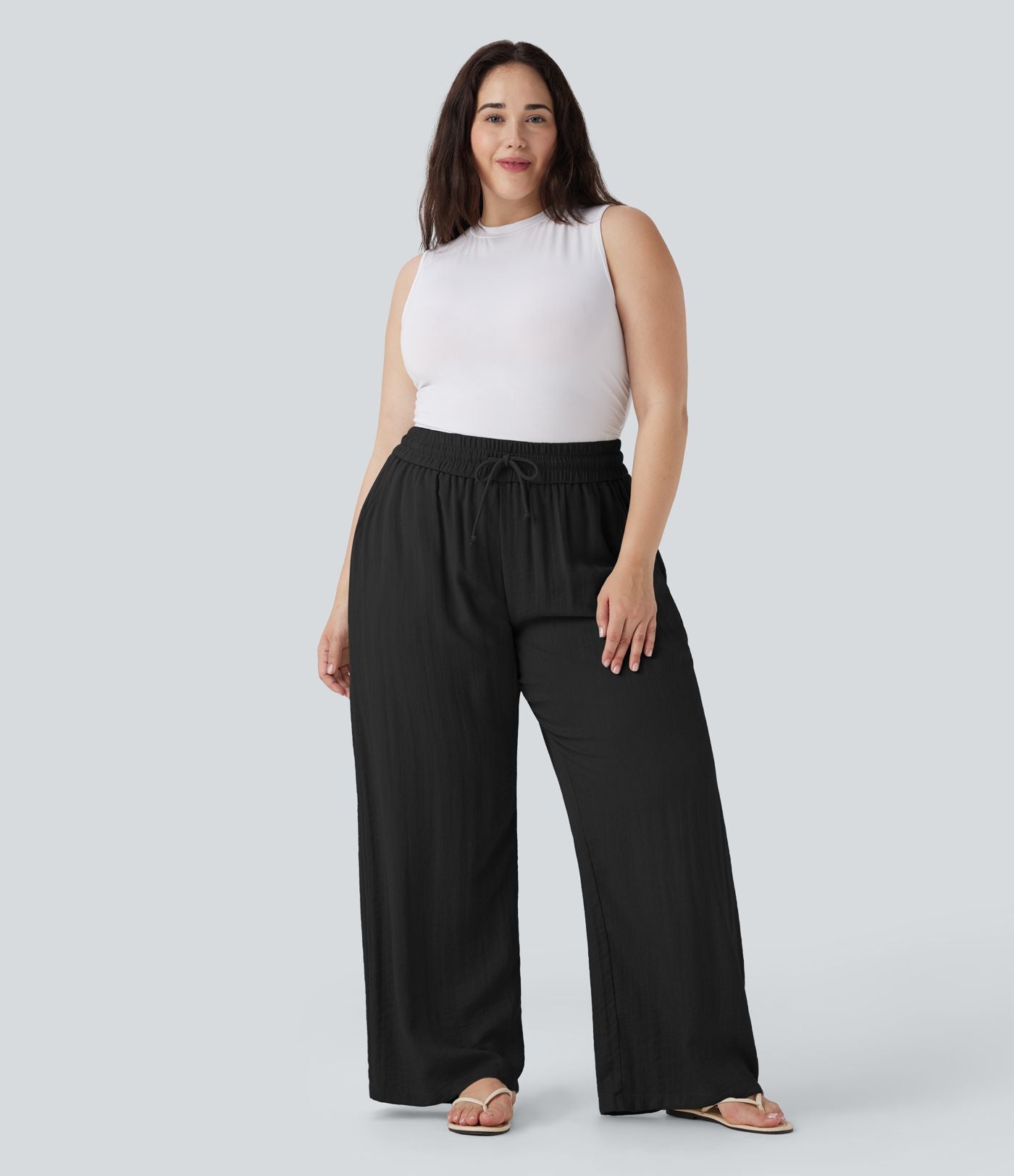 Pantalon décontracté grande taille large fluide taille haute effet lin avec cordon de serrage et poches