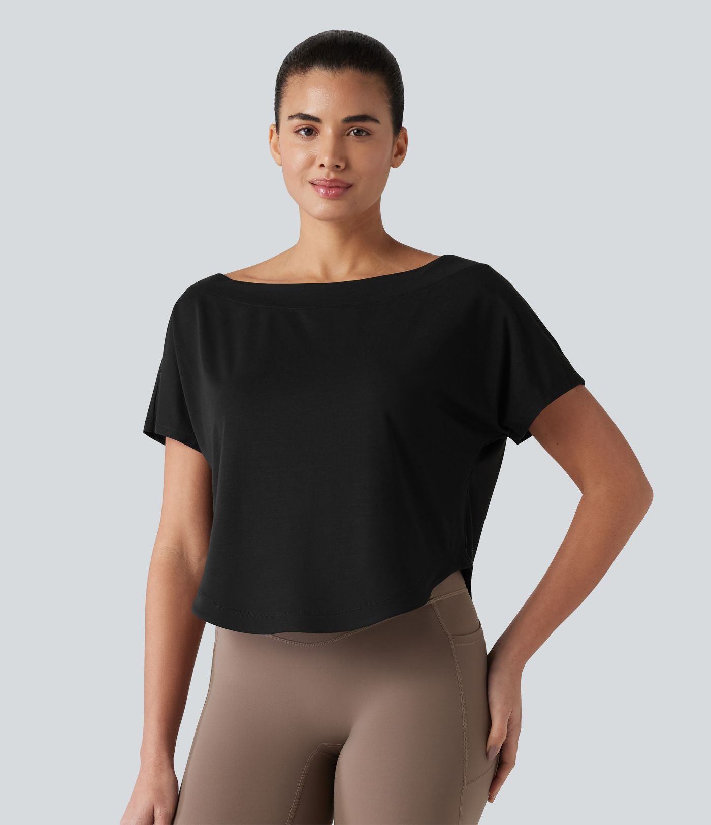 Haut de sport yoga asymétrique à une épaule manches courtes ourlet arrondi asymétrique séchage rapide
