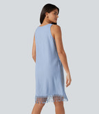 Robe mini sans manches col V avec ourlet à franges