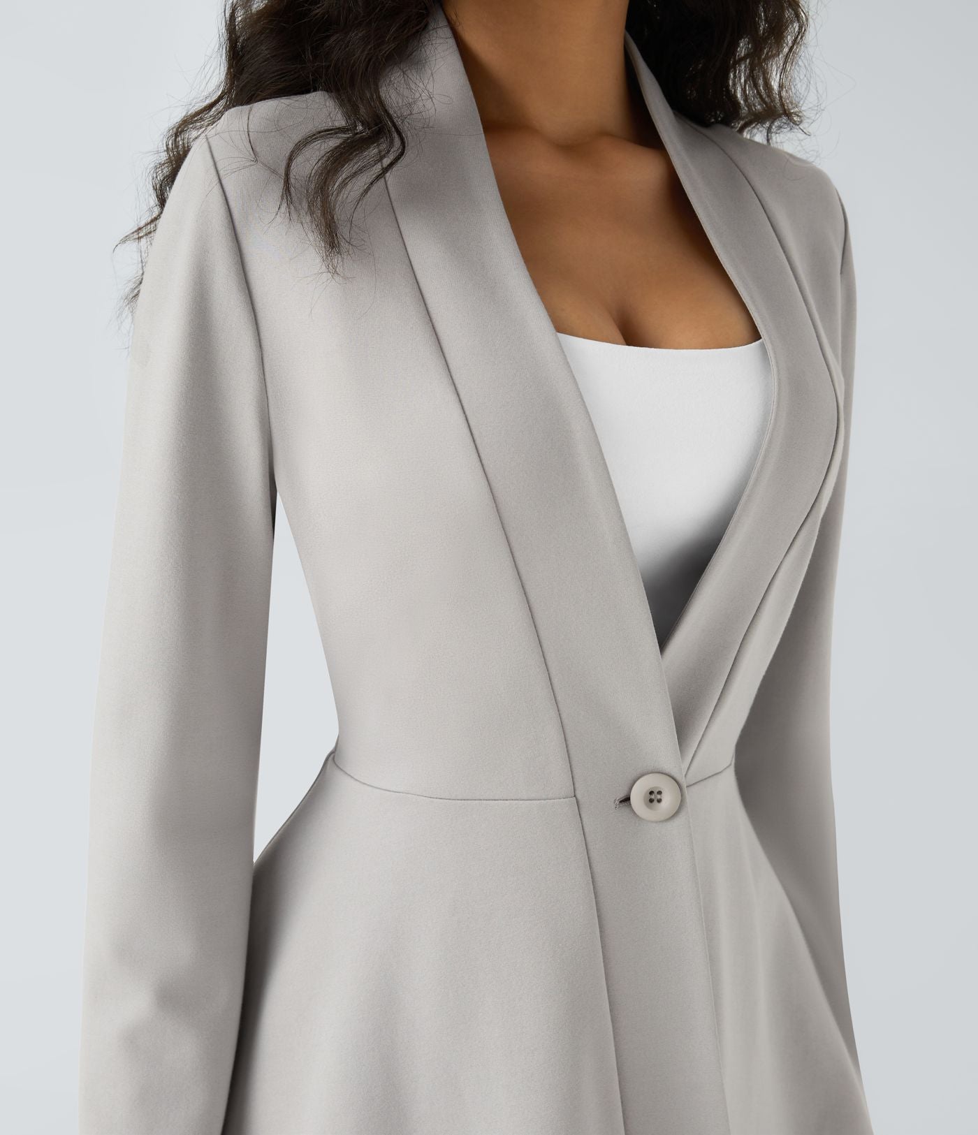 Veste péplum de travail col en V avec un bouton