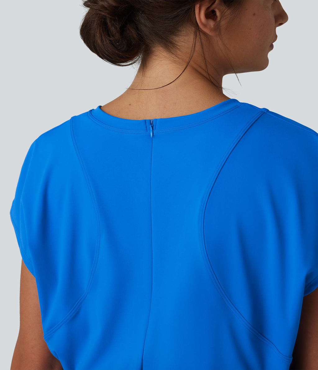 Robe sport de tennis mini 2-en-1 à col V, manches courtes et ourlet plissé avec fermeture éclair invisible et poches