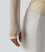 Haut de yoga asymétrique manches longues mesh avec ouverture pouce