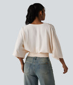 Blouse décontractée effet lin col V, manches chauve-souris et détails froncés