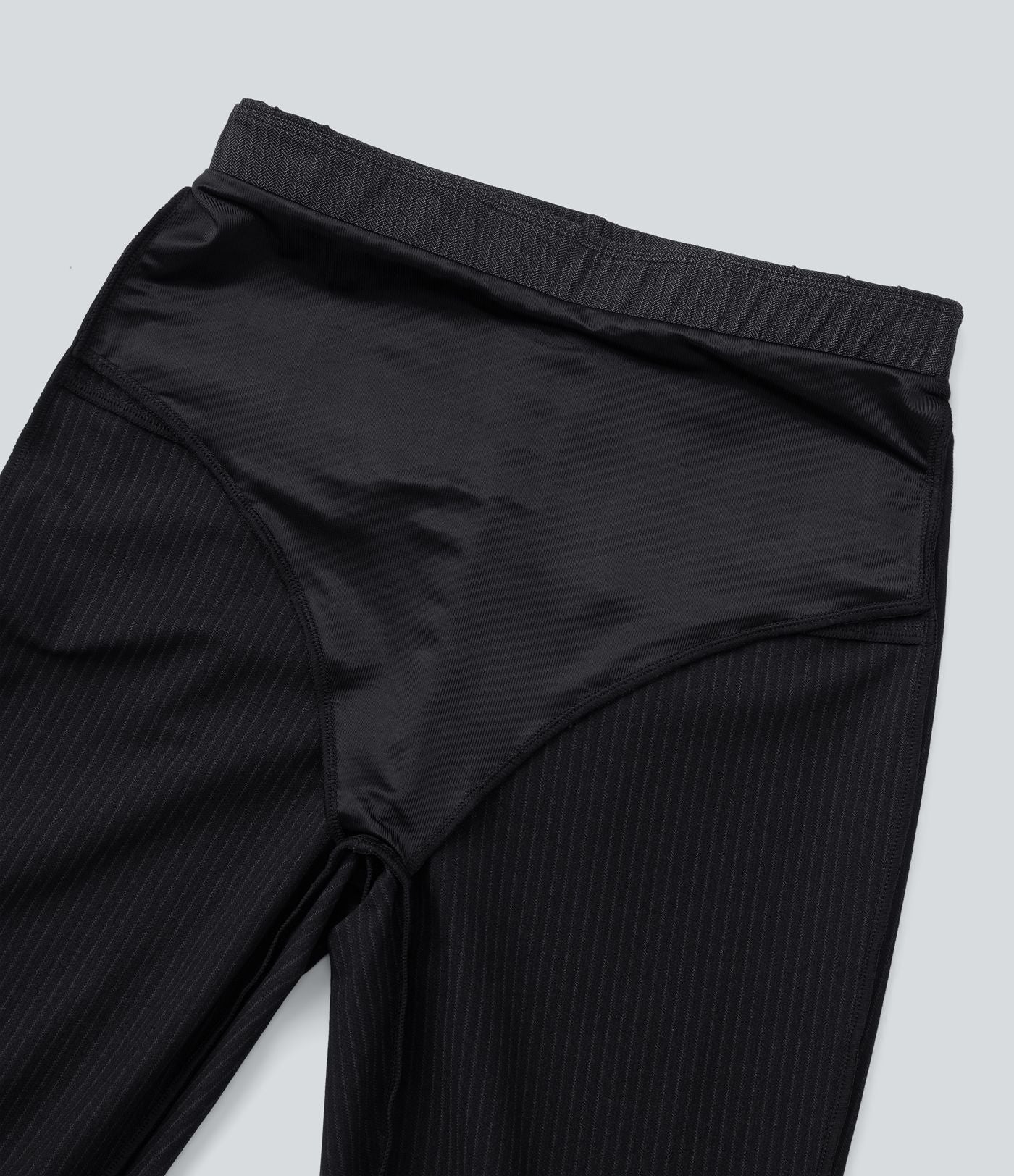 Pantalon tailleur skinny gainant taille haute à chevrons avec poches arrière zippées décoratives
