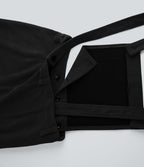 Salopette en velours côtelé avec bretelles ajustables et bavette amovible avec poche