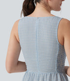 Robe longue fluide casual aspect lin col bateau sans manches à carreaux avec poches