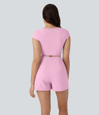 Combinaison de yoga Softlyzero™ Airy avec col U, manches courtes et poches latérales - Édition Easy Peasy