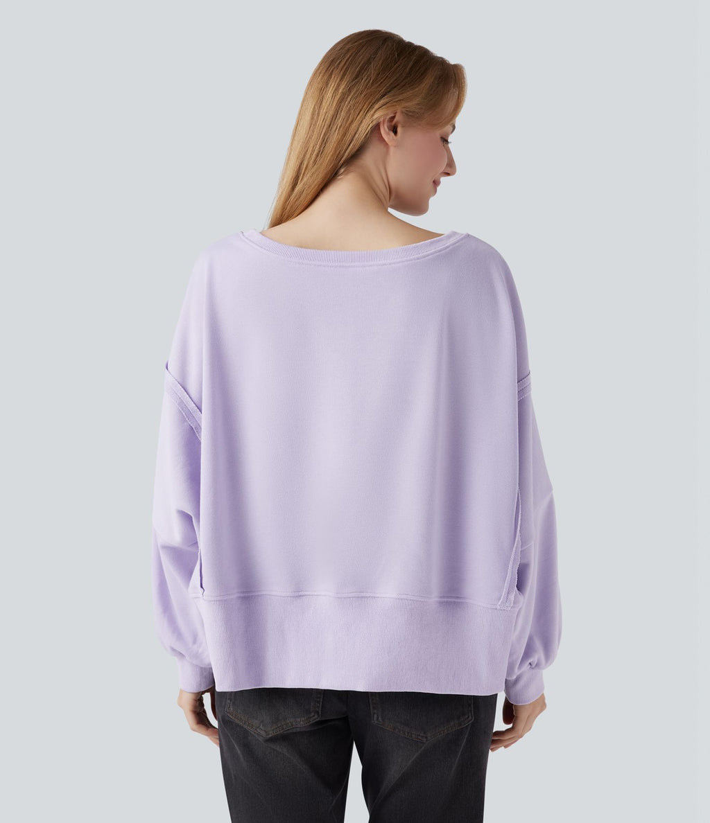 Sweat-shirt décolleté bateau à manches longues ourlet asymétrique