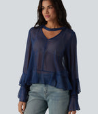 Chemise casual transparente col V manches longues à volants