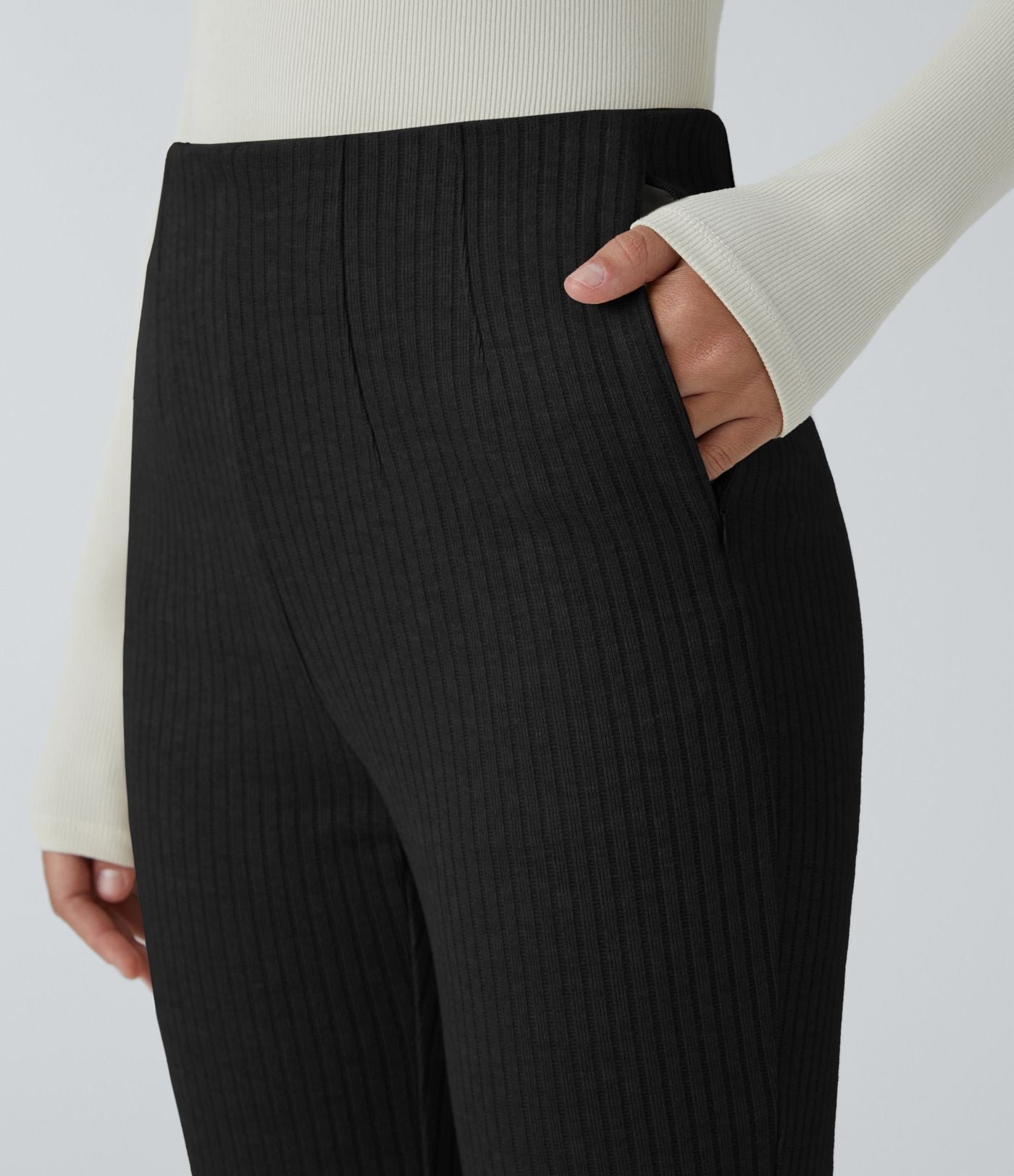 Pantalon décontracté évasé en maille côtelée à taille haute et poches zippées latérales