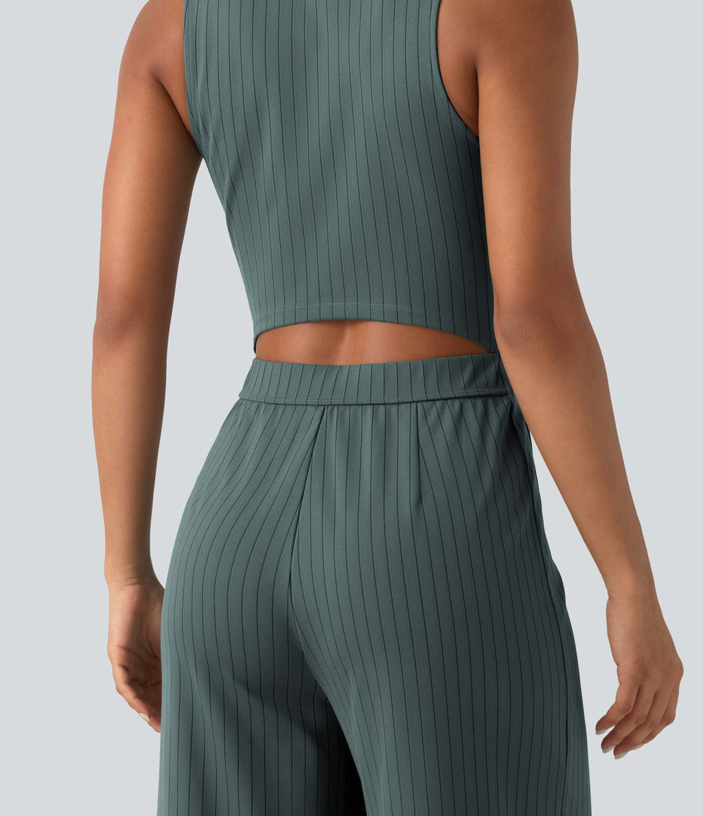 Combinaison tailleur rayée à jambes larges, décolleté en V, découpe et poches