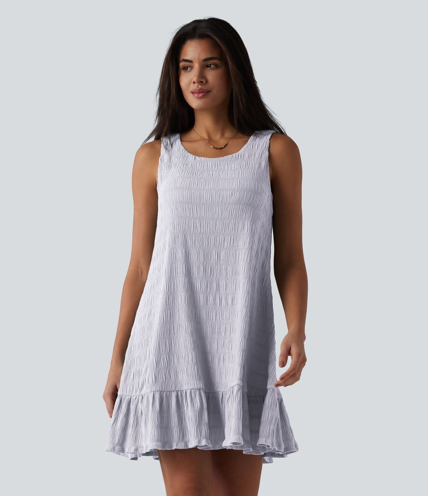 Robe courte décontractée sans manches à col rond, soutien-gorge intégré et ourlet à volants