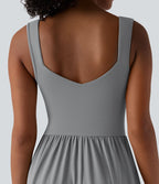 Robe midi fluide sans manches dos croisé ouvert avec poches