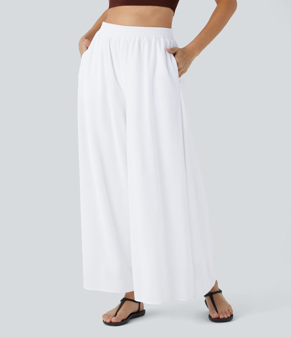 Pantalon fluide et ample avec superposition en mesh, poches latérales et taille haute